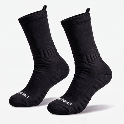 A pair of black athletic crew socks with white branding text on the toes, displayed against a clean white background.