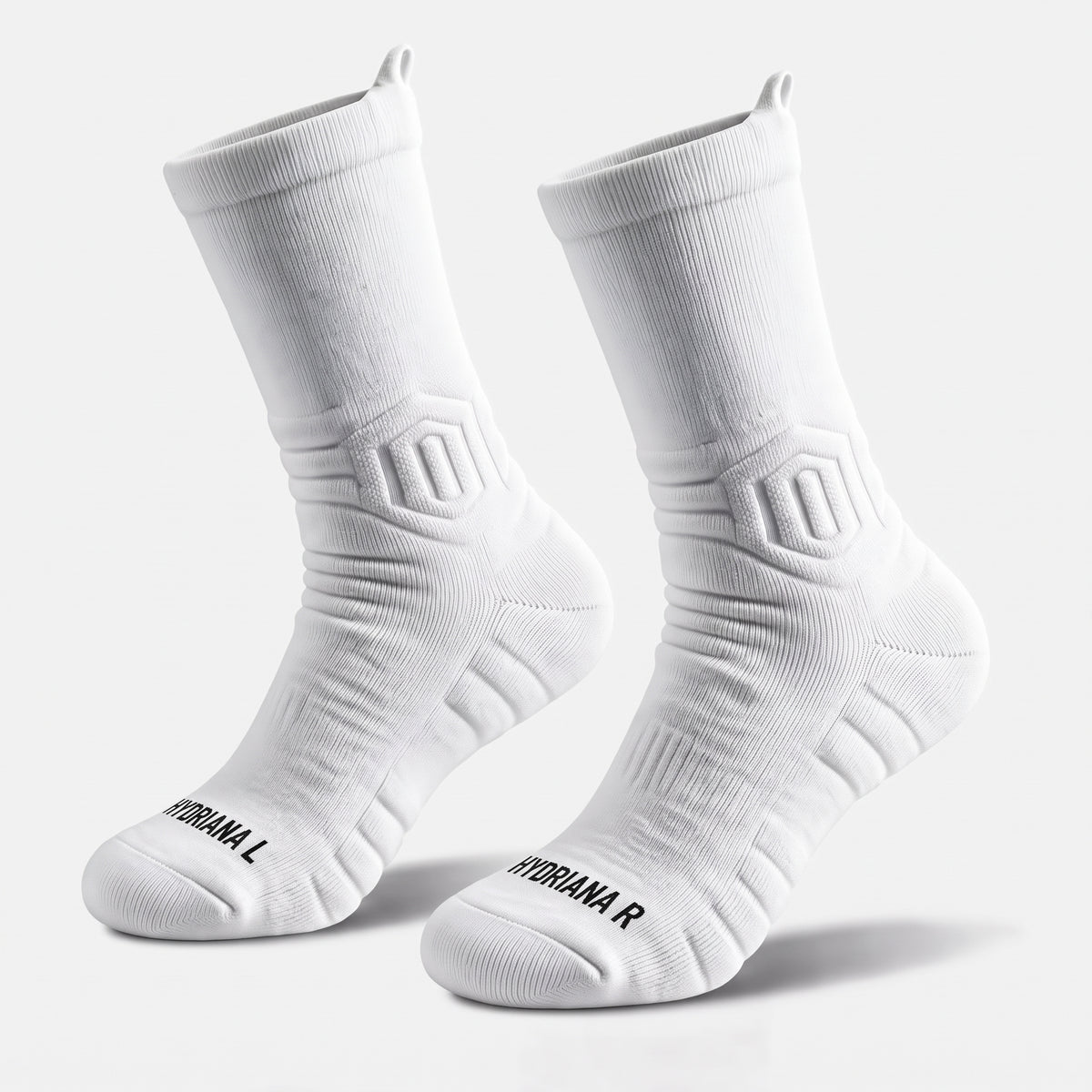 A pair of white athletic crew socks with black text reading 'HYDRANA L' and 'HYDRANA R' near the toes, displayed on a light gray background.